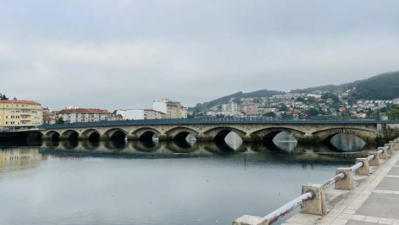 When we started our Camino de Santiago in Pontevedra, most of the people on the Burgos Bridge in this photo were other pilgrims. They were easily recognizable by their backpacks and walking sticks.