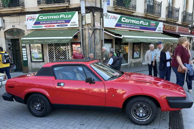 A red Triumph TR7.