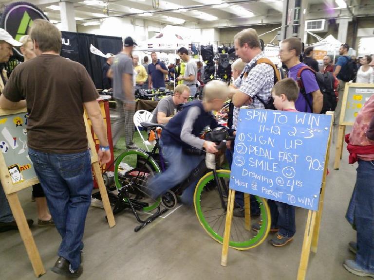 A kid participating in the fast pedaling competition.