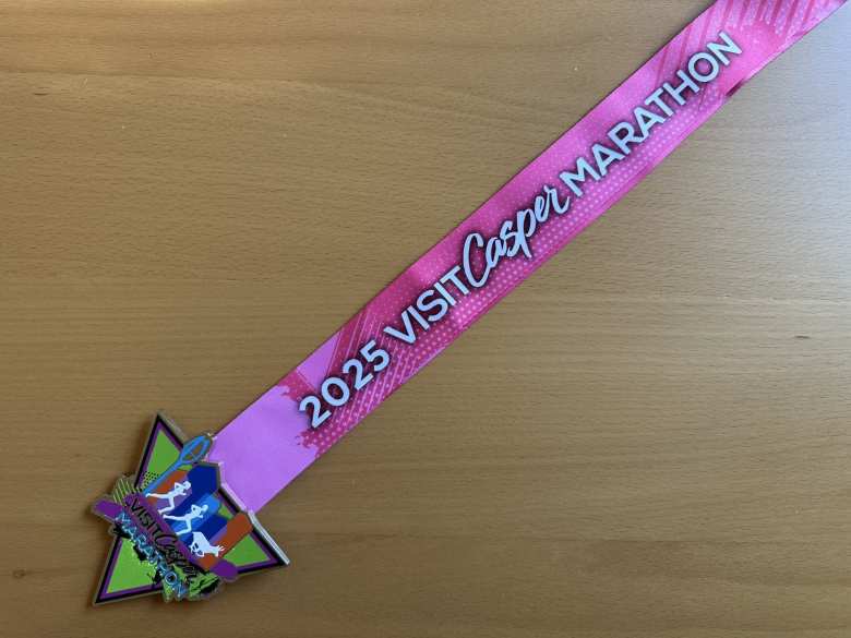 The finisher's medal for the 2025 Visit Casper Marathon.