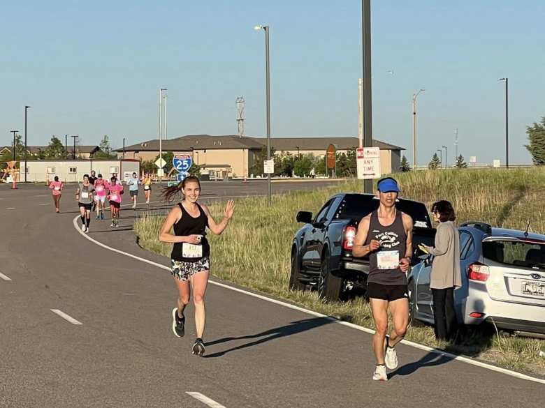 Passing a half-marathoner on a downhill around Mile 4.