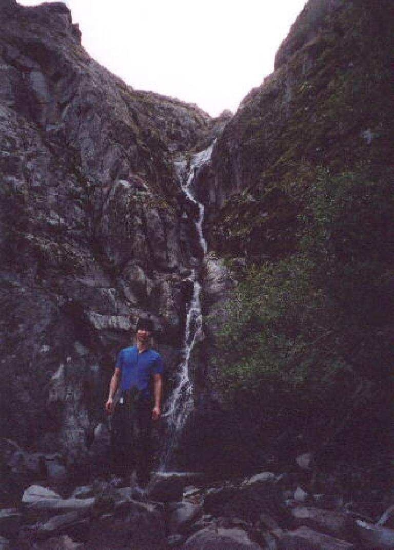 [Ohlone Wilderness Trail, Jan 2002] Felix Wong with the falls in the background.