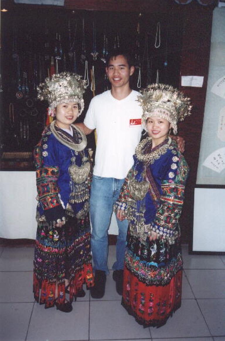 That's me with two ethnic-minority sisters, who had just danced, sung, and played musical instruments for us in Yueyang.
