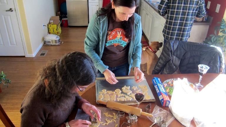 Cutting one of the first batch of cookies.