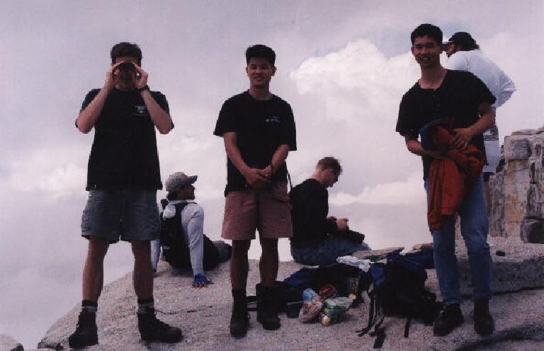 That's Scott, Dave, and I after taking an hour's nap at the top of Half Dome! Mike was up there too, somewhere...