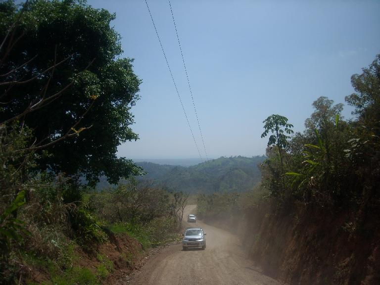 Motoring up a dirt road to the zip-lines.